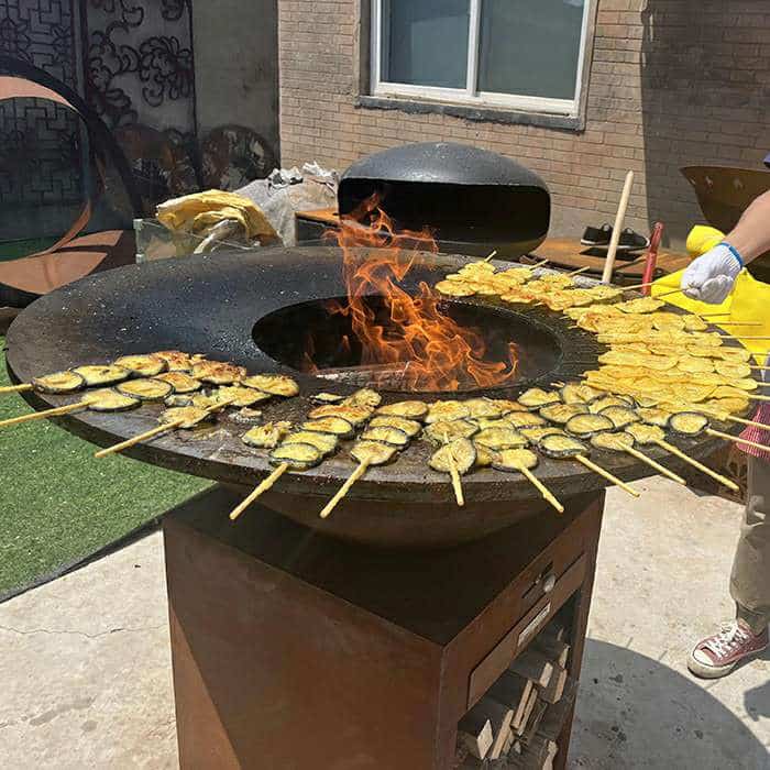 food and emotion gathering with corten steel bbq grill