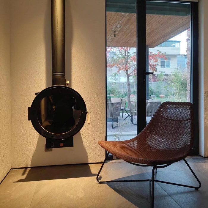 Tire shape wall hung fireplace