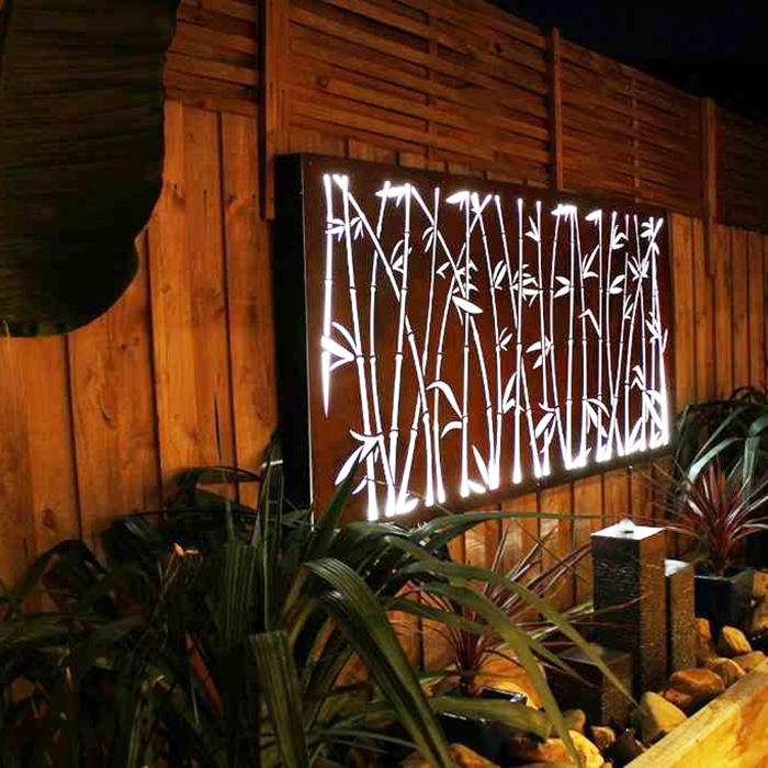 corten steel screen fence with light