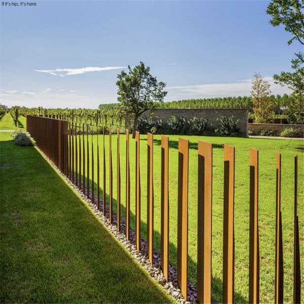 Garden Rusty metal picket fence