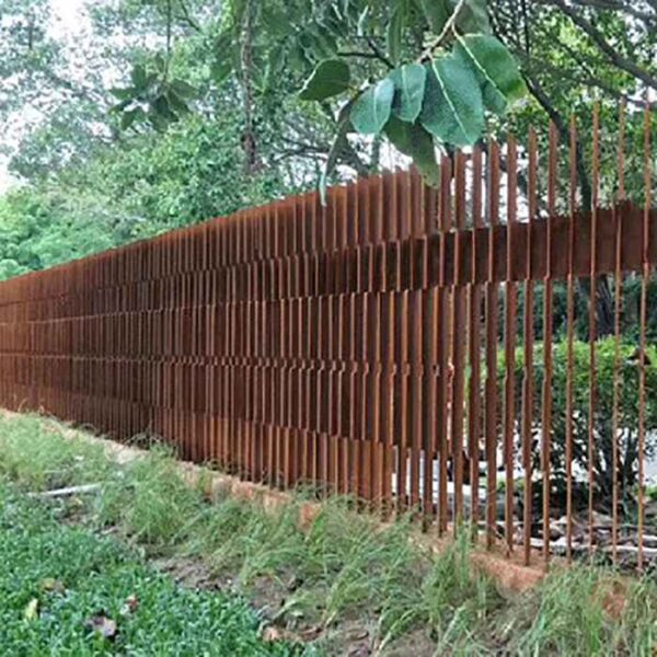 Garden Rusty metal picket fence