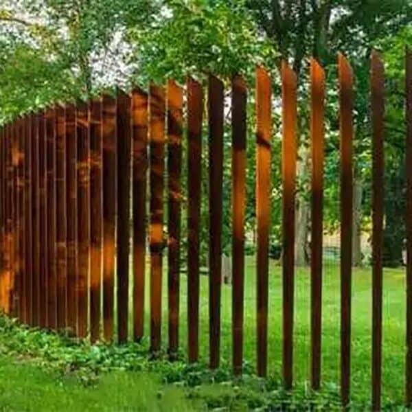 Garden Rusty metal picket fence